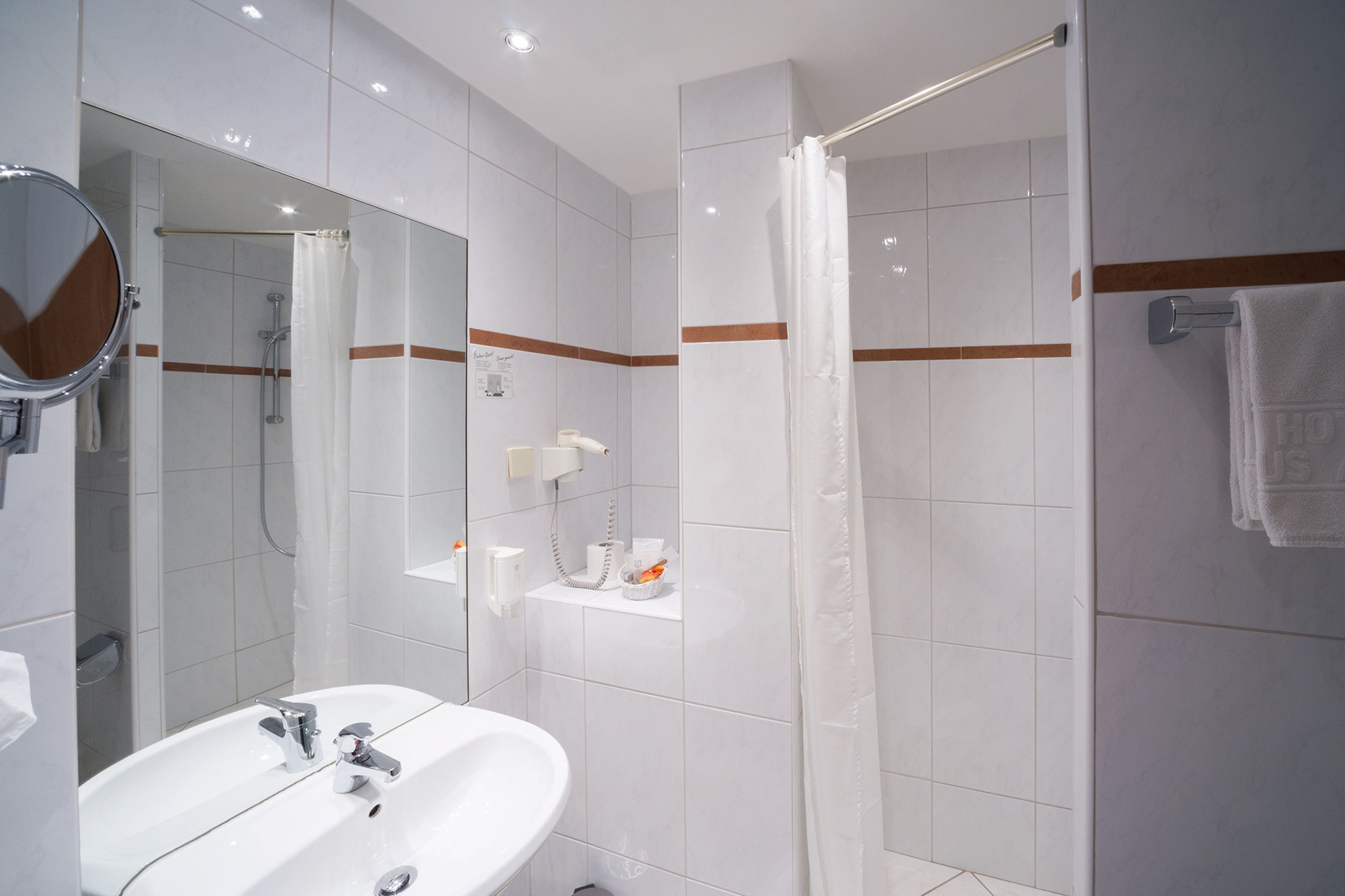 free toiletries, hair dryer, slippers, towels