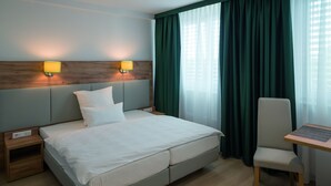 Studio – comfort (Muensterstrasse) | Allergitestet sengetøy, dundyner, safe på rommet og skrivebord