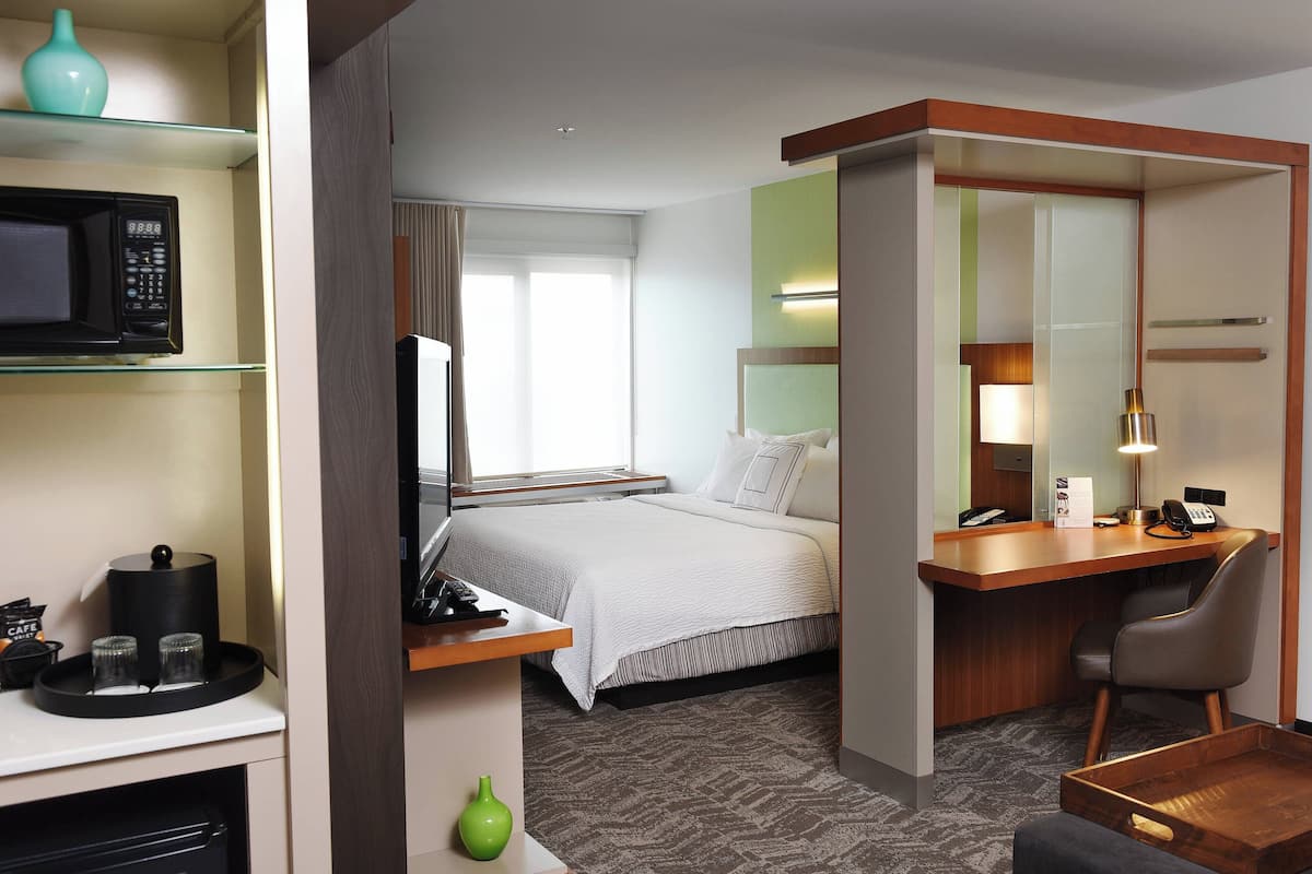 down duvets, pillow-top beds, desk, blackout curtains