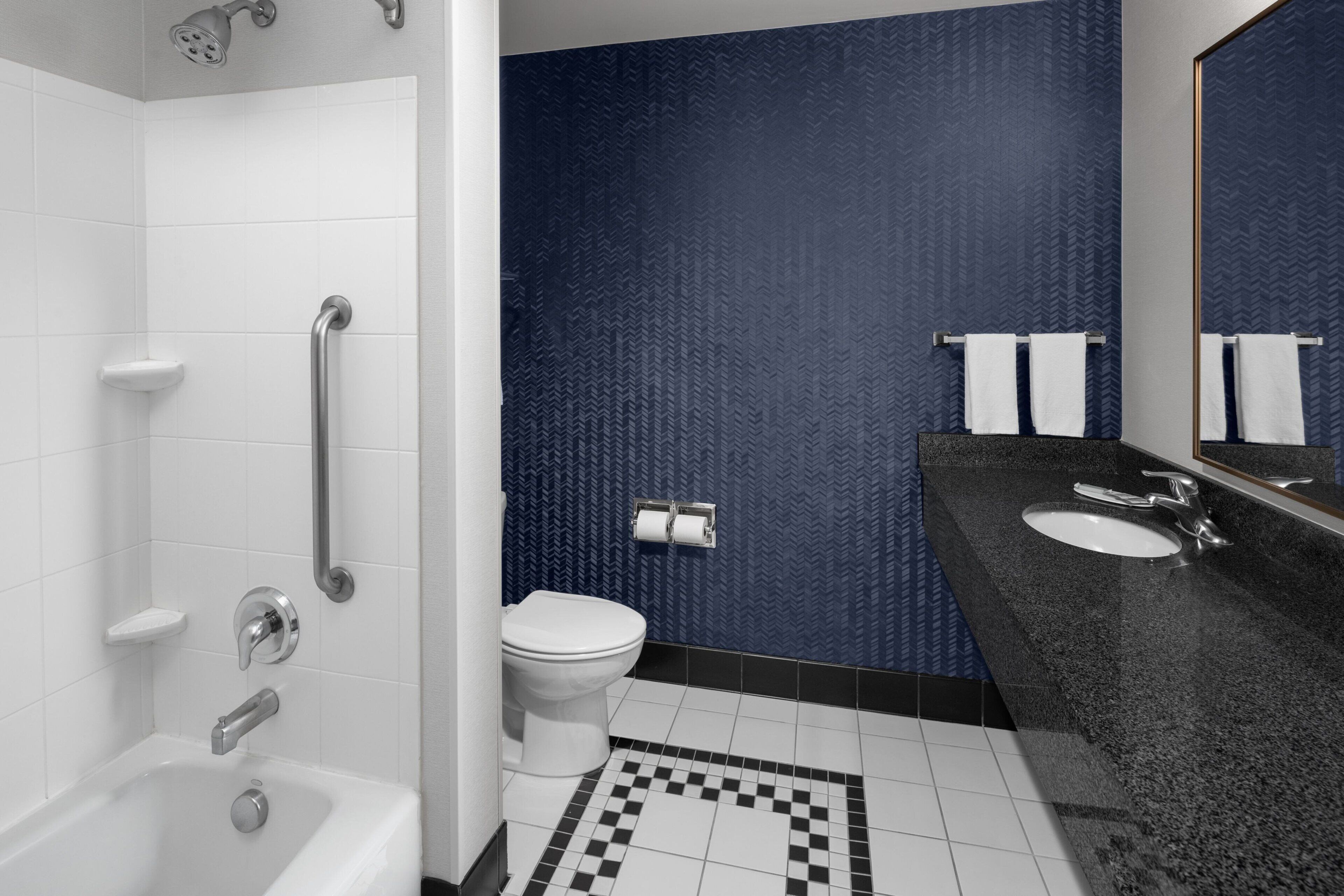 bathtub, hair dryer, towels