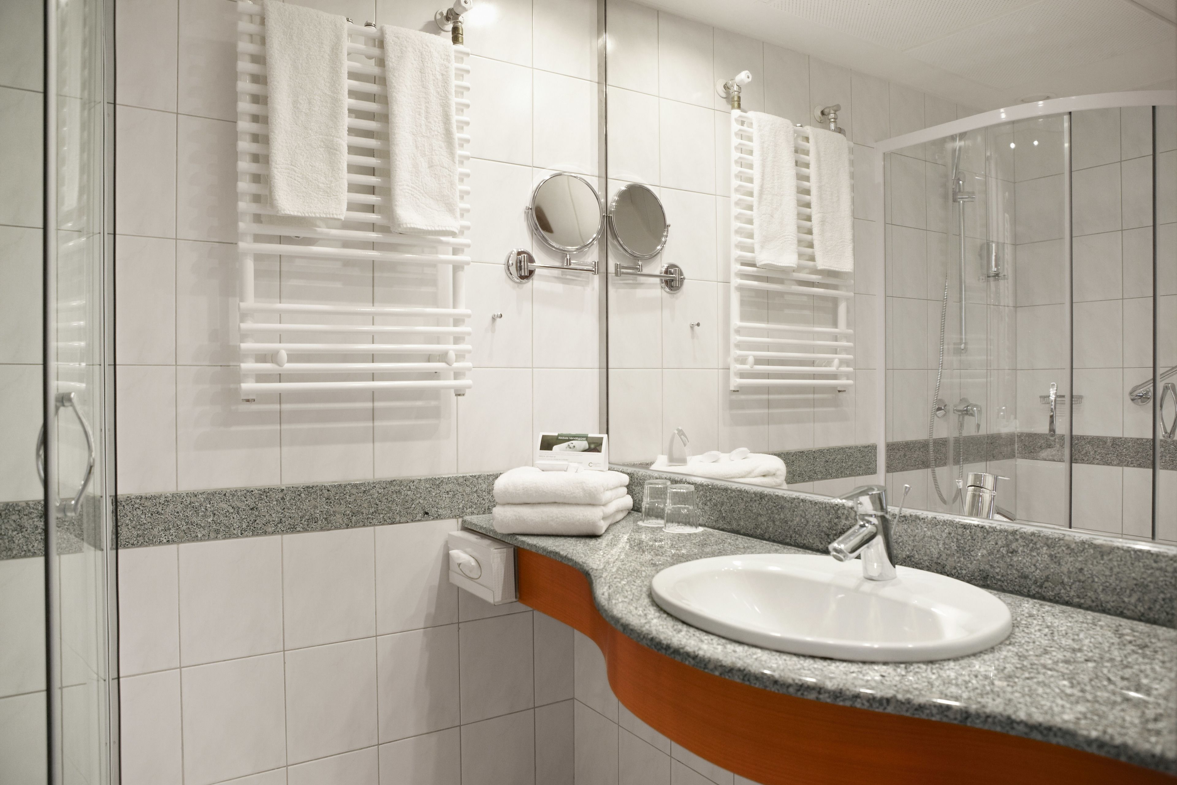 hair dryer, bathrobes, slippers, towels