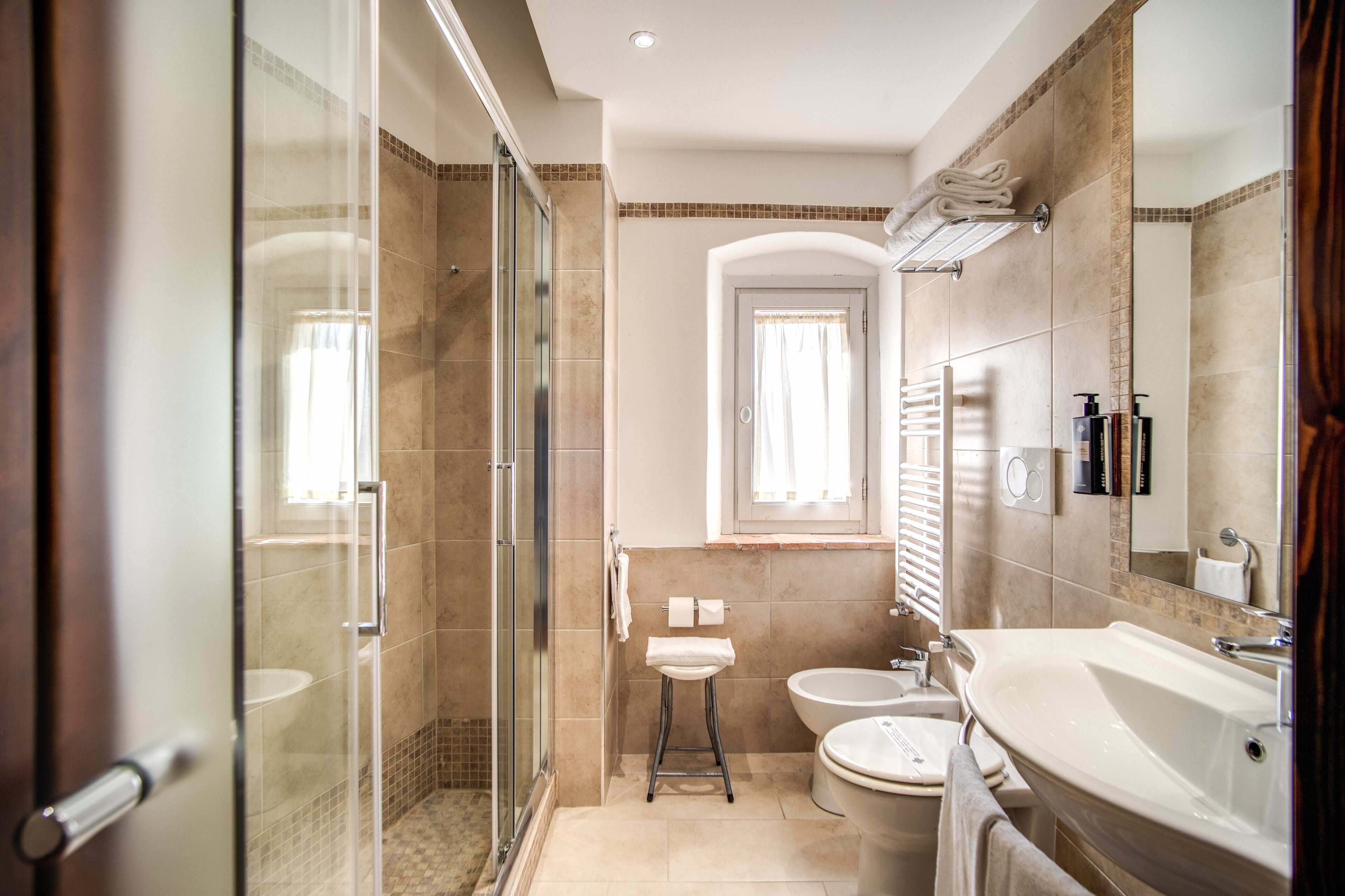 free toiletries, hair dryer, bidet, towels