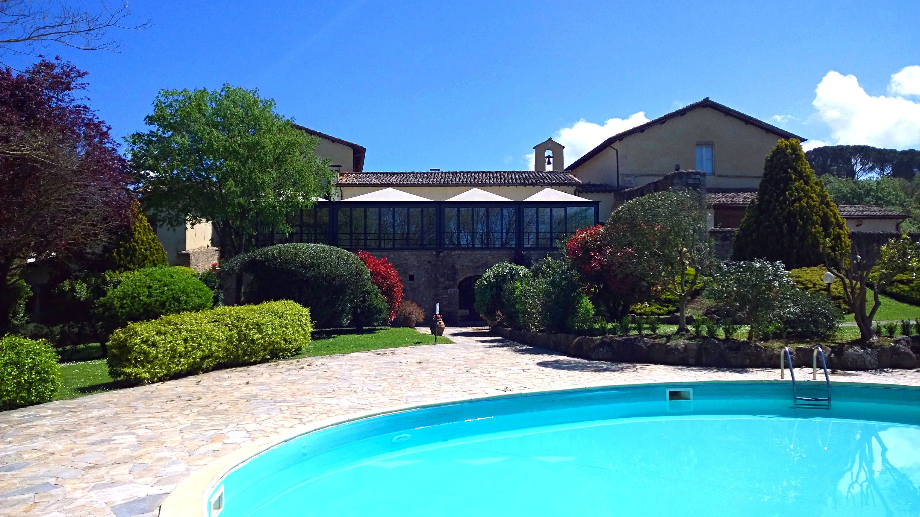 outdoor pool, pool umbrellas, pool loungers