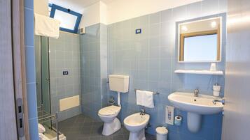 Shower, free toiletries, hair dryer, bathrobes