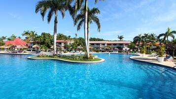 Outdoor pool, pool umbrellas, sun loungers