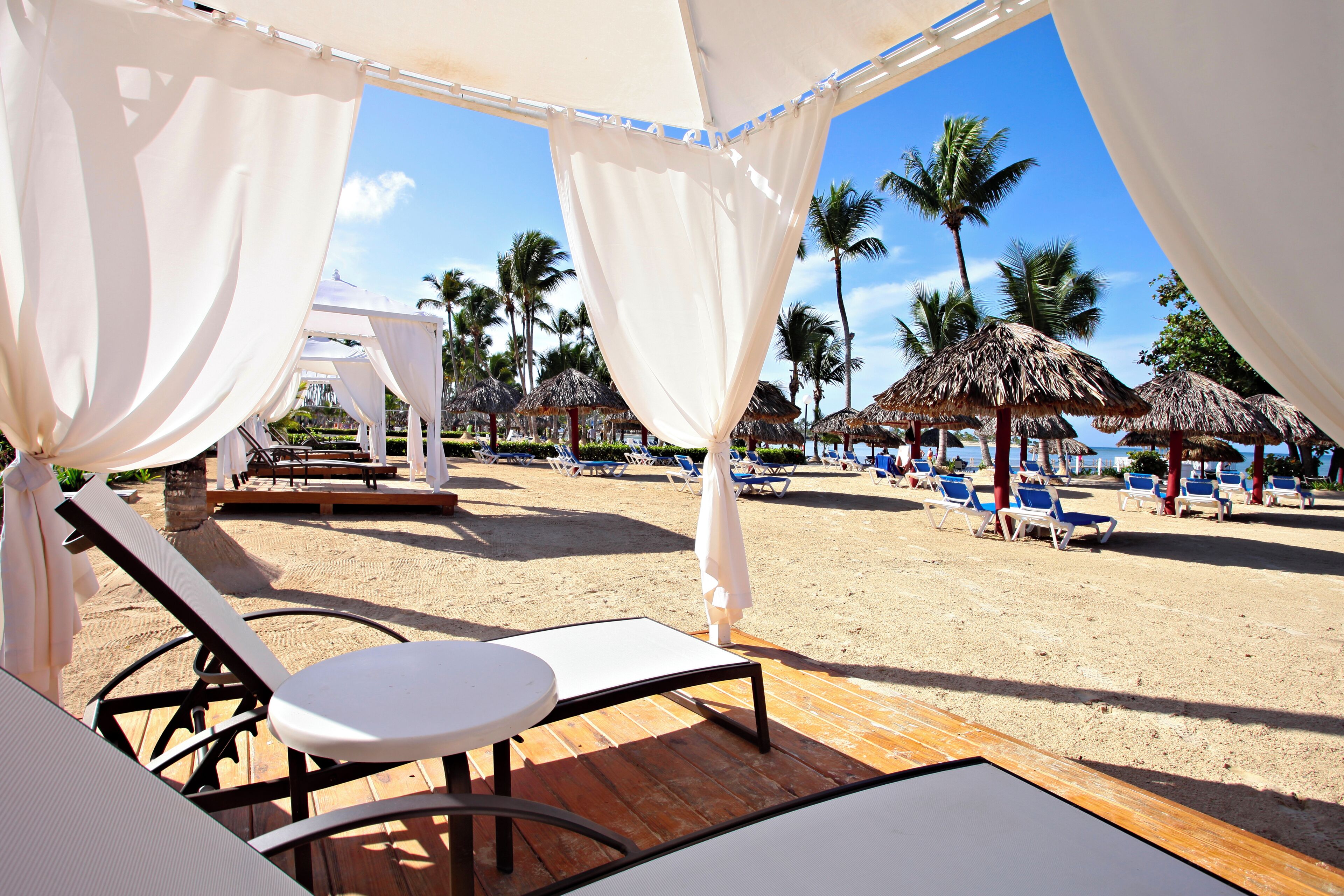 On the beach, sun-loungers, beach umbrellas, beach towels