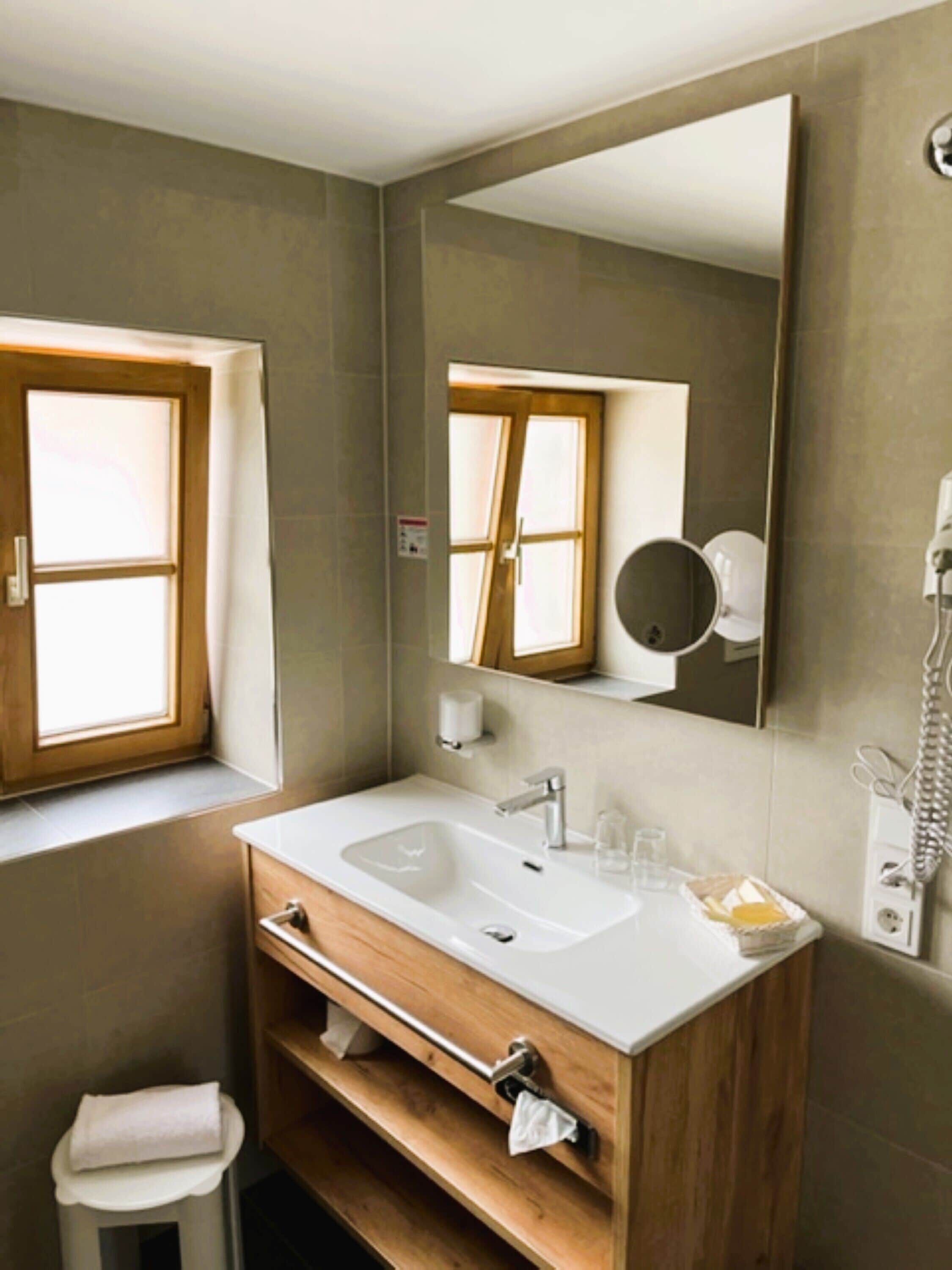 family room | bathroom | shower, free toiletries, hair dryer, slippers