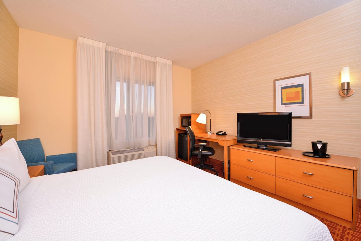 Premium bedding, desk, blackout curtains, iron/ironing board