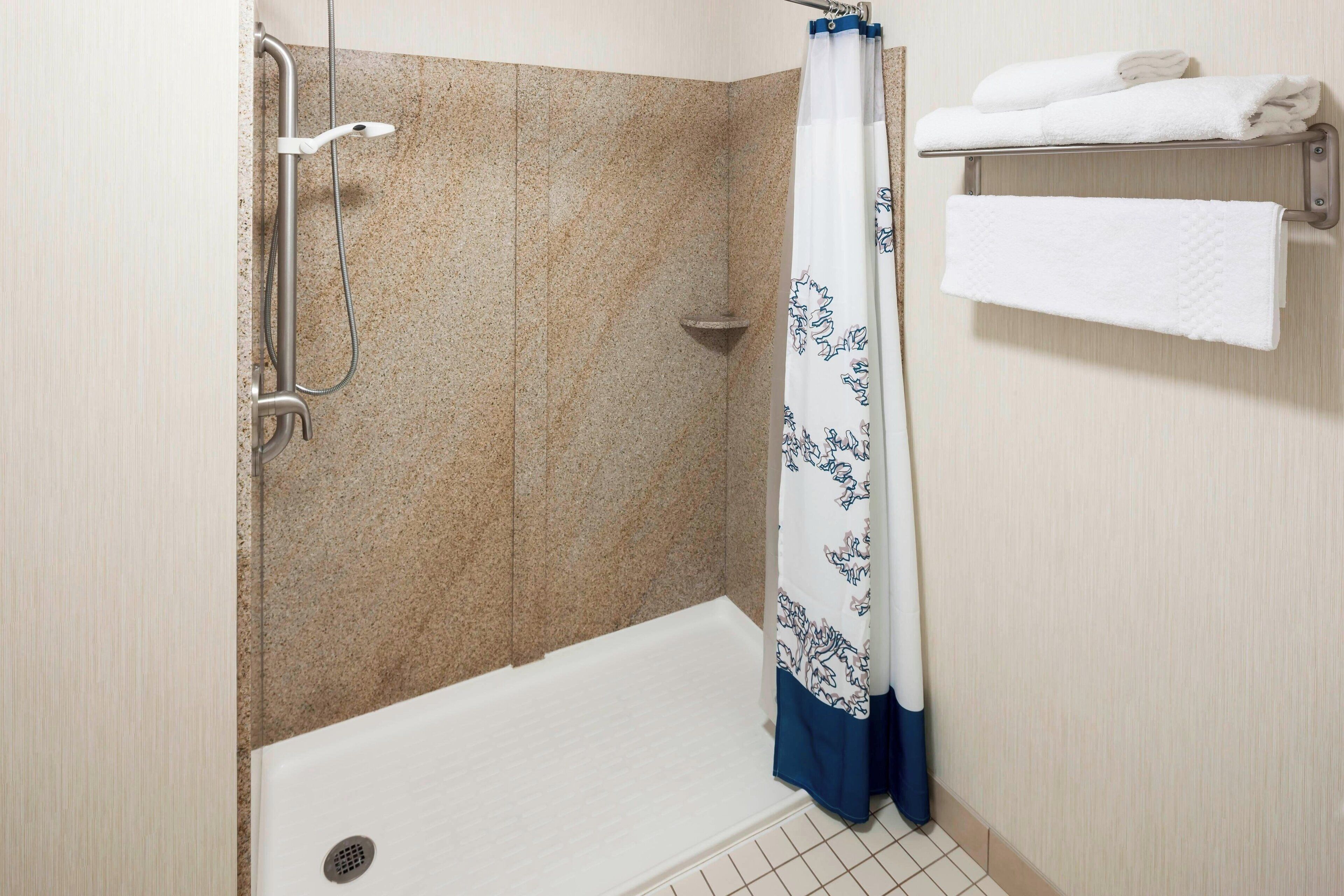 combined shower/bathtub, free toiletries, hair dryer, towels