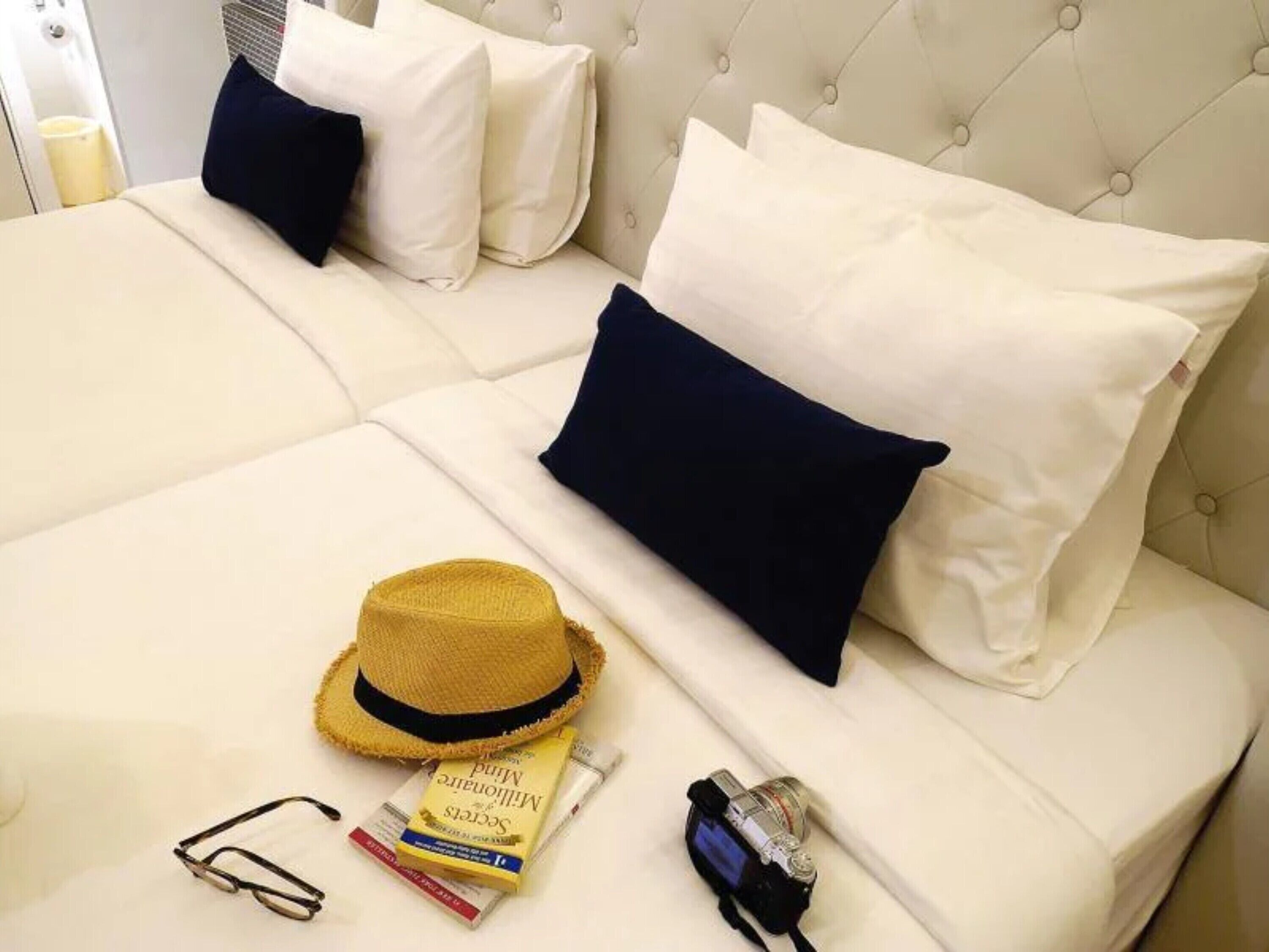 deluxe twin room | bathroom | shower, rainfall showerhead, free toiletries, hair dryer