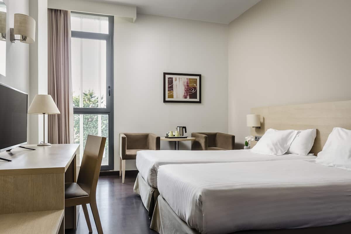 Ropa de cama de alta calidad y minibar