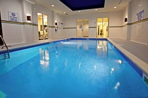 An indoor swimming pool with clear signage indicating no diving and swim at your own risk. - Holiday Inn Louisville Airport - Fair/Expo by IHG (Louisville)