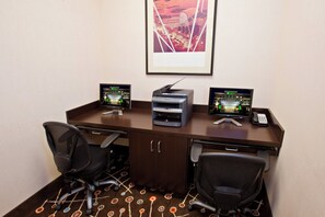 A hotel office with two monitors, a printer, and a telephone. - Holiday Inn Louisville Airport - Fair/Expo by IHG (Louisville)