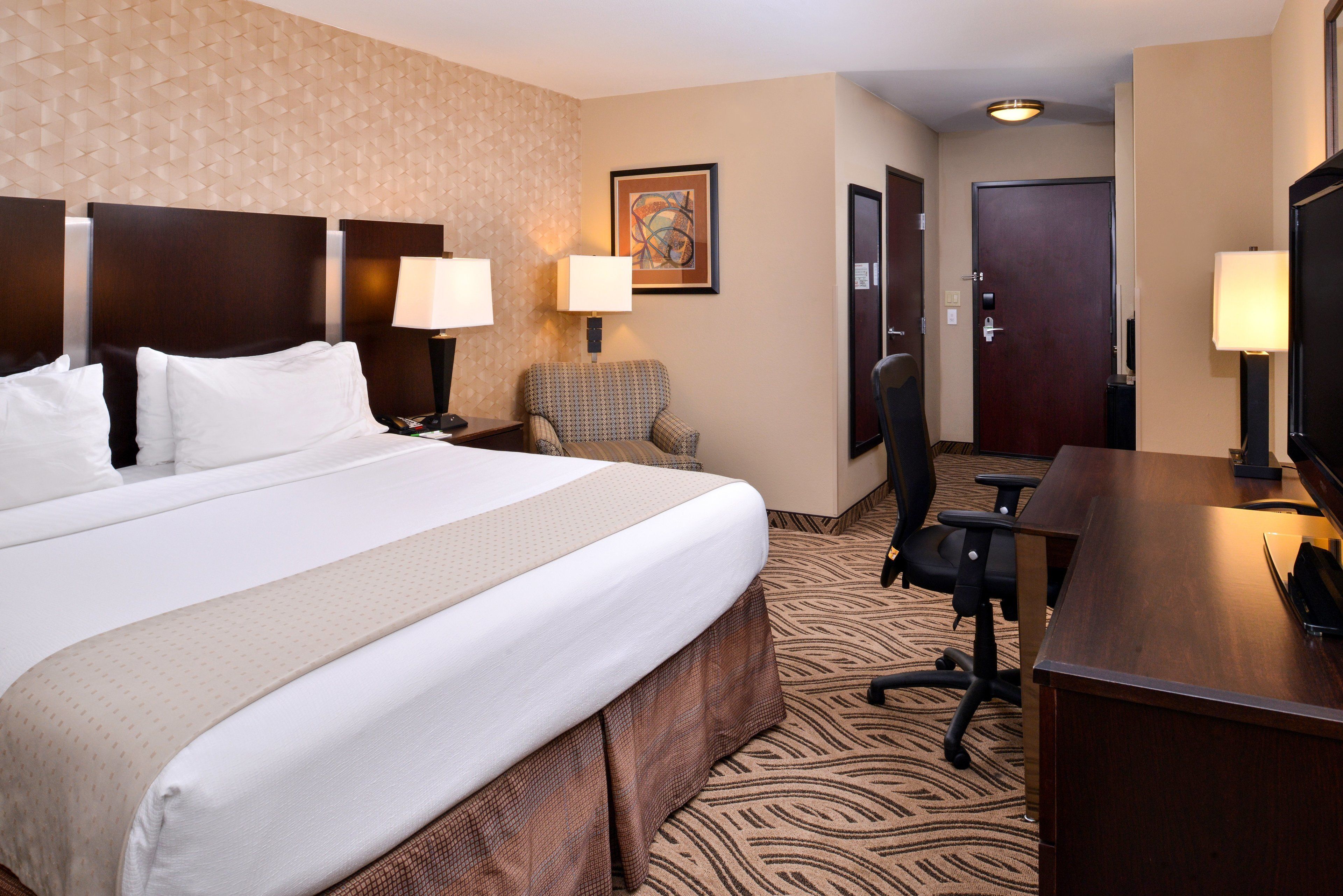 Hypo-allergenic bedding, pillow-top beds, in-room safe, desk