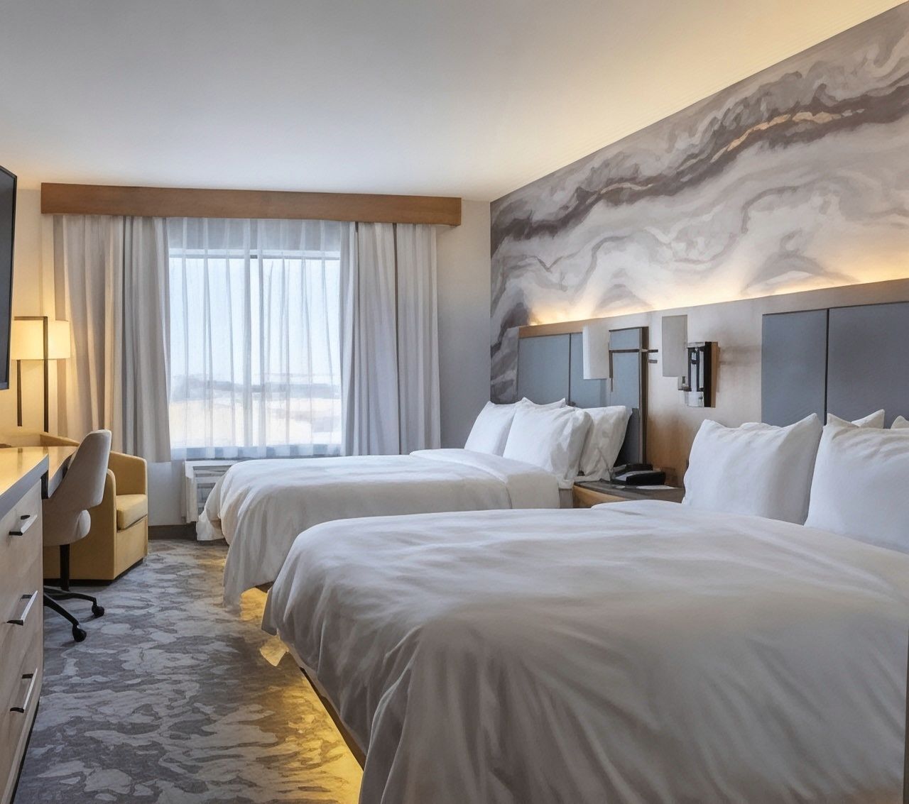 Hypo-allergenic bedding, pillow-top beds, in-room safe, desk