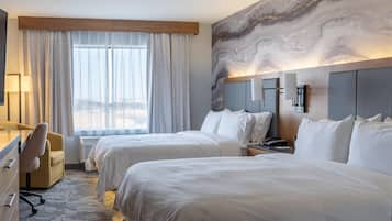 Hypo-allergenic bedding, pillowtop beds, in-room safe, desk
