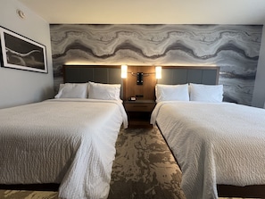 Hypo-allergenic bedding, pillowtop beds, in-room safe, desk