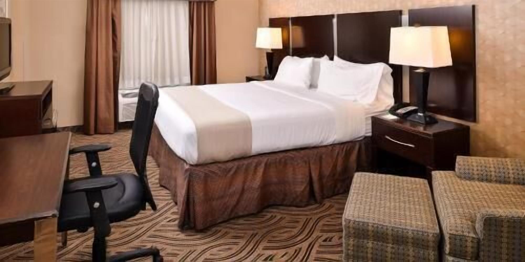Hypo-allergenic bedding, pillow-top beds, in-room safe, desk