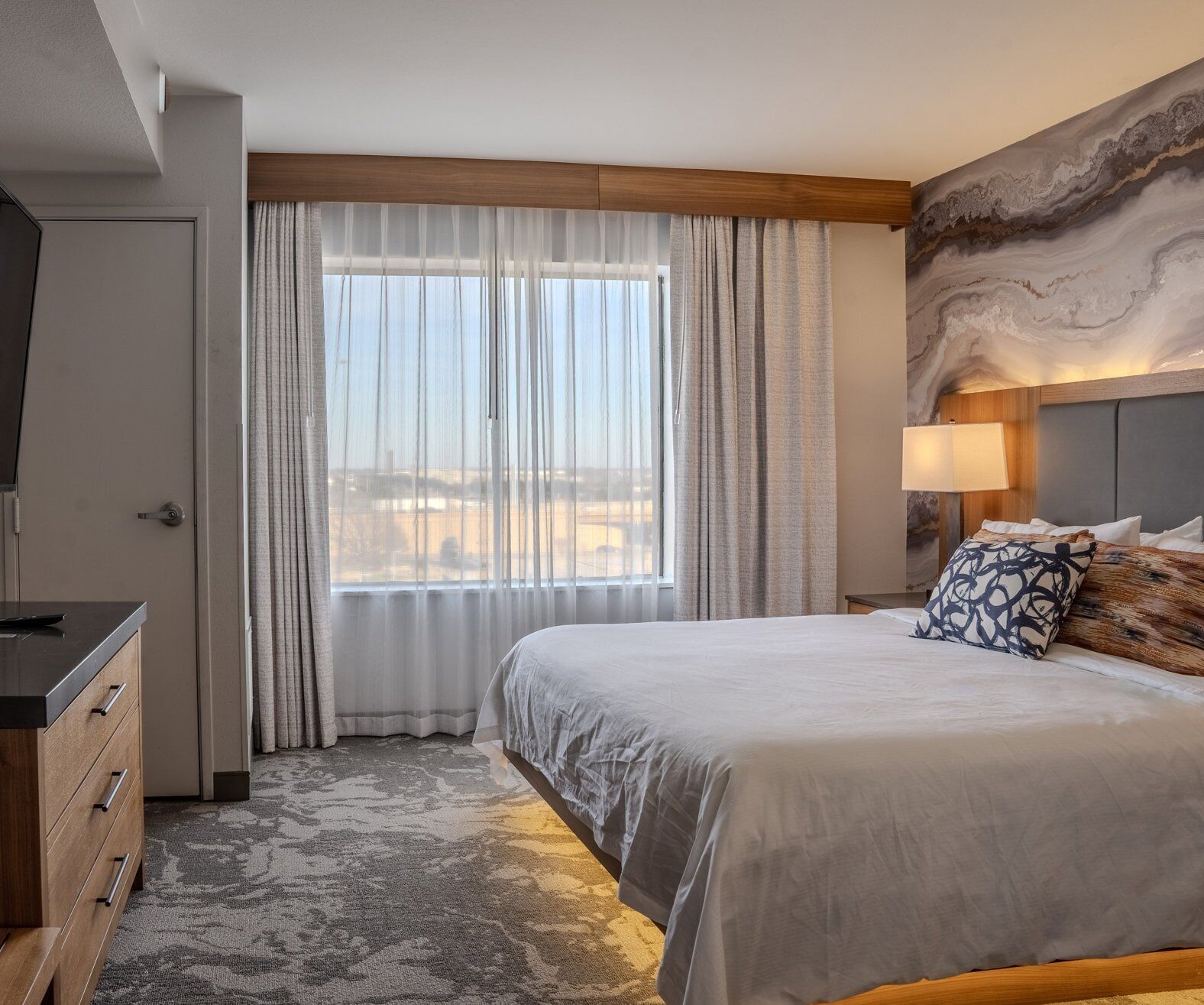 Hypo-allergenic bedding, pillow-top beds, in-room safe, desk