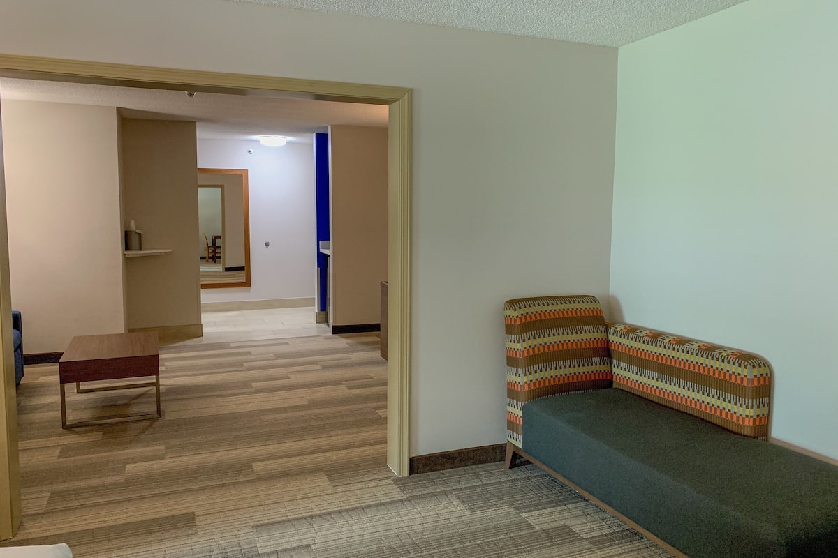 premium bedding, desk, blackout curtains, iron/ironing board