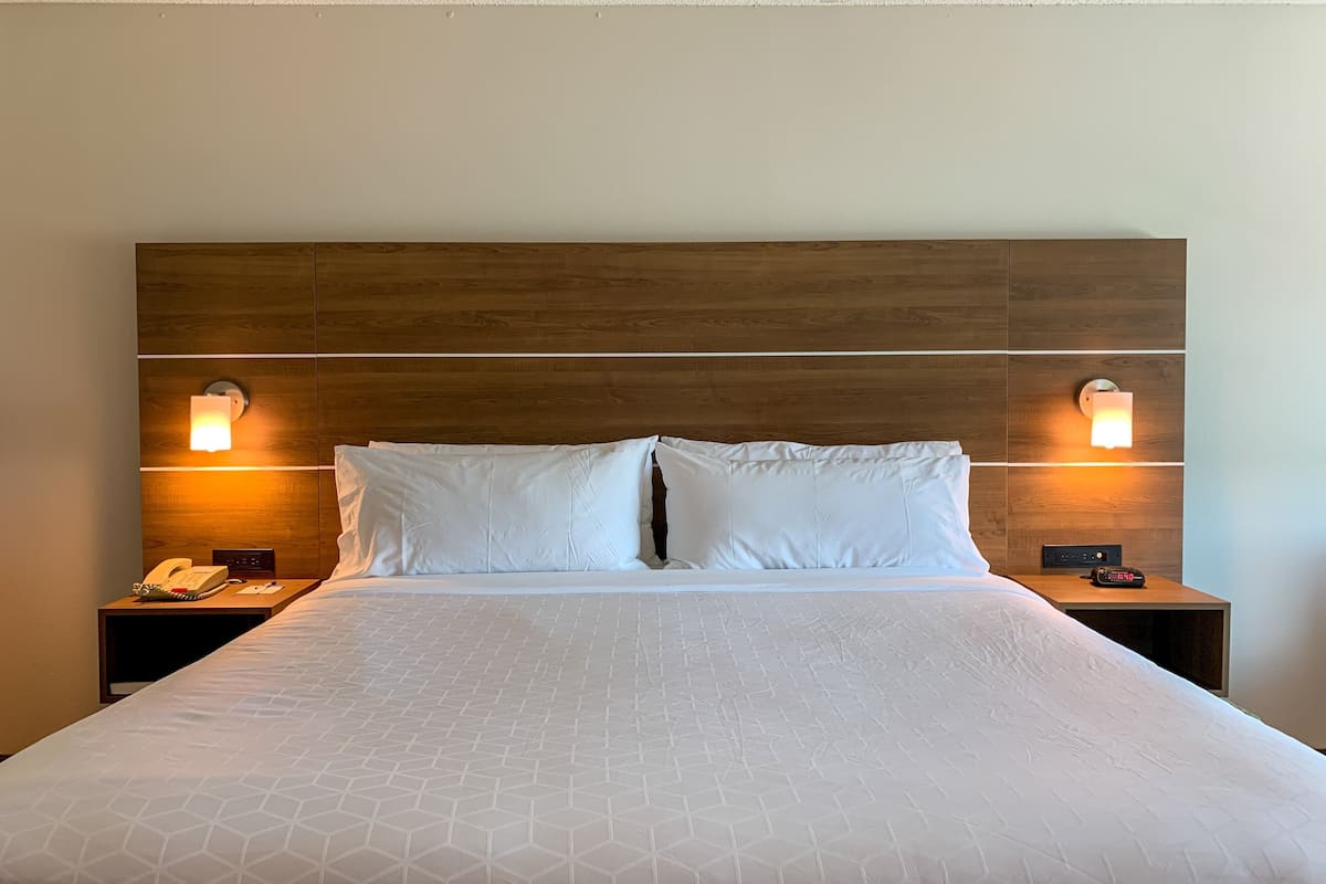 premium bedding, desk, blackout curtains, iron/ironing board