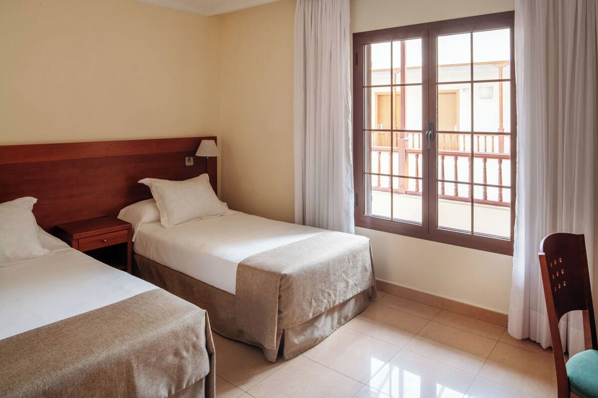 Premium bedding, minibar, desk, laptop workspace