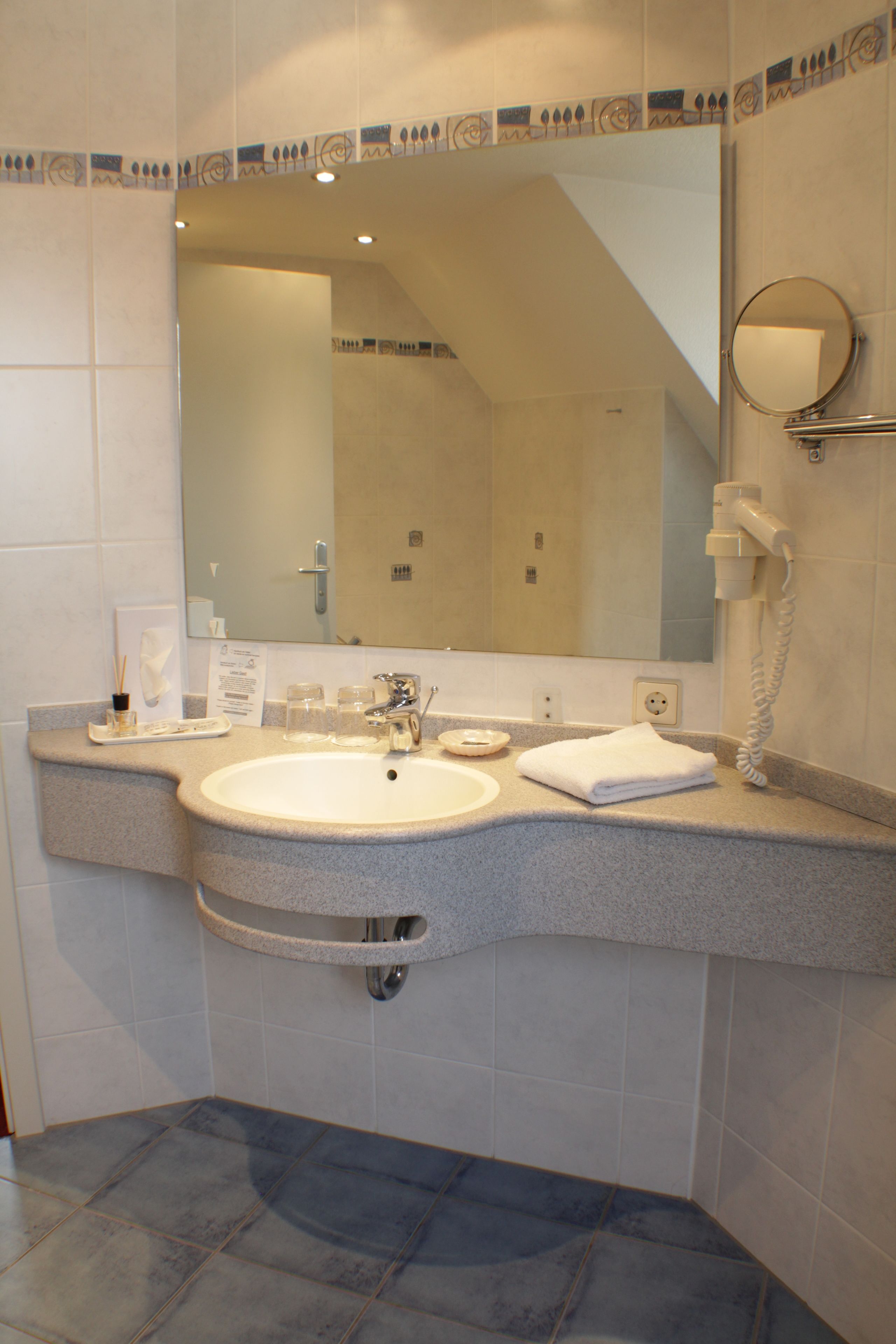 free toiletries, hair dryer, dressing gowns, towels