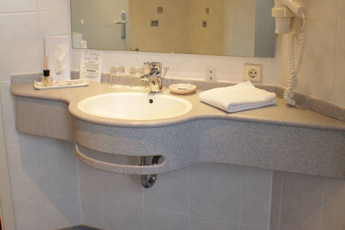 free toiletries, hair dryer, dressing gowns, towels