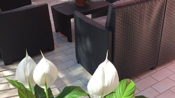 Habitación triple | Terraza o patio
