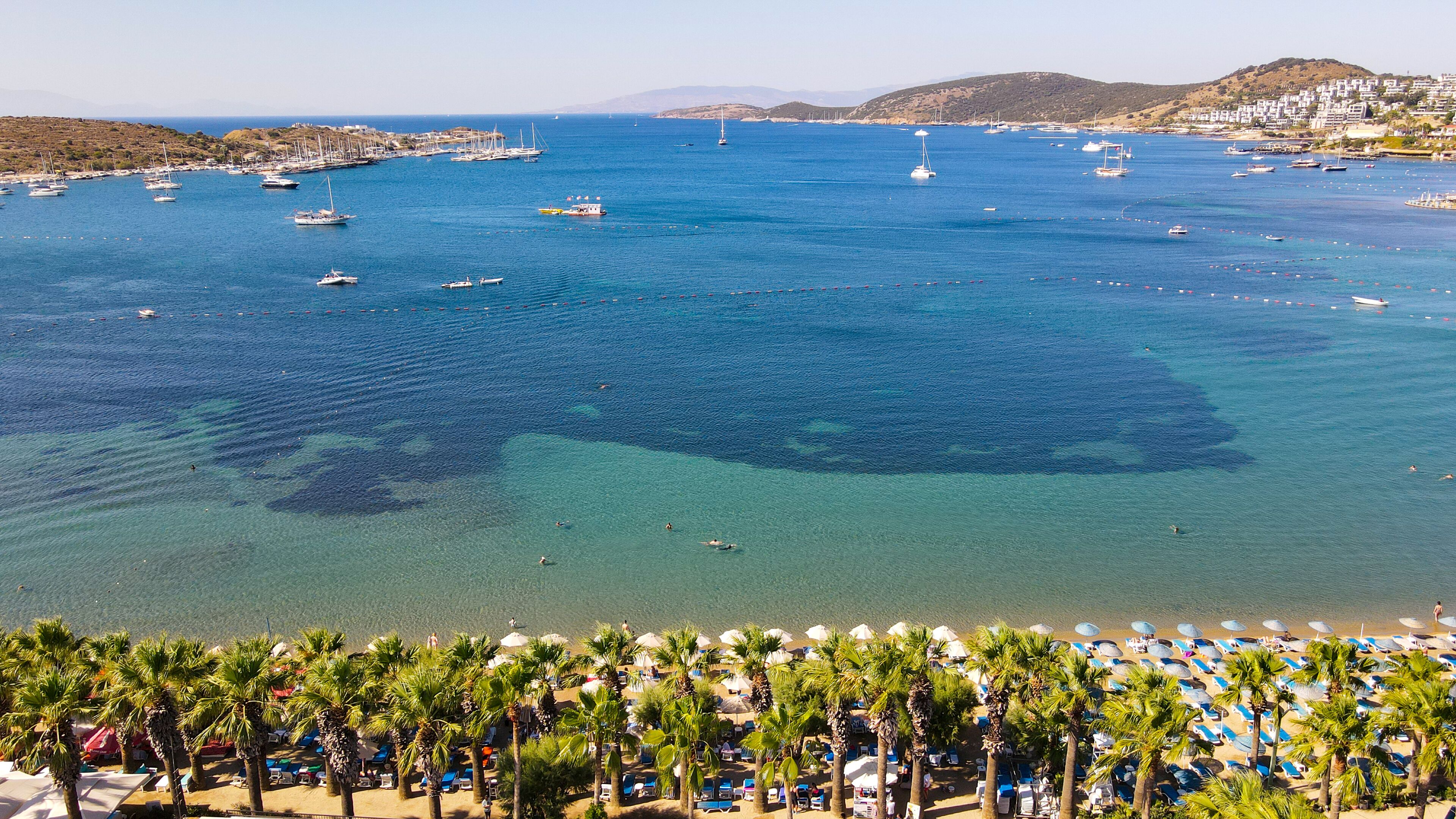 Private beach, sun loungers, beach umbrellas, water skiing
