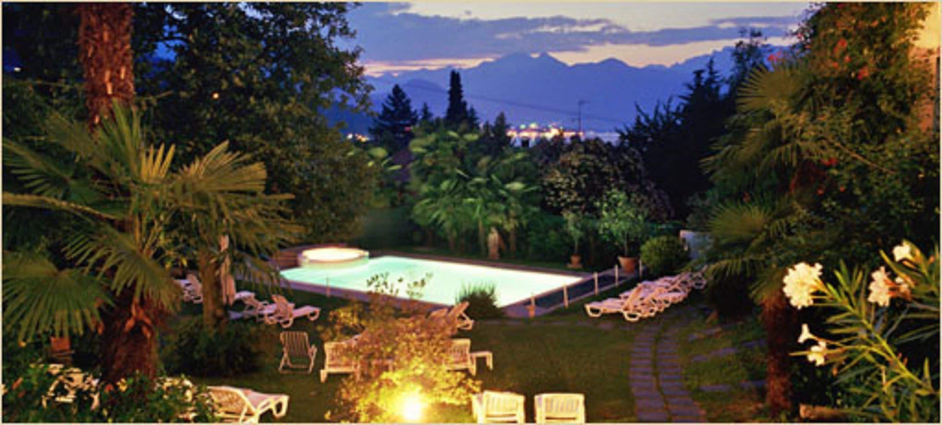 seasonal outdoor pool, pool umbrellas, pool loungers