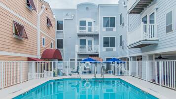 Outdoor pool, open 8:00 AM to 10:00 PM, sun loungers