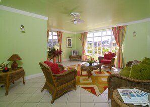 Two Bedroom Suite | Living area | 32-inch TV with cable channels