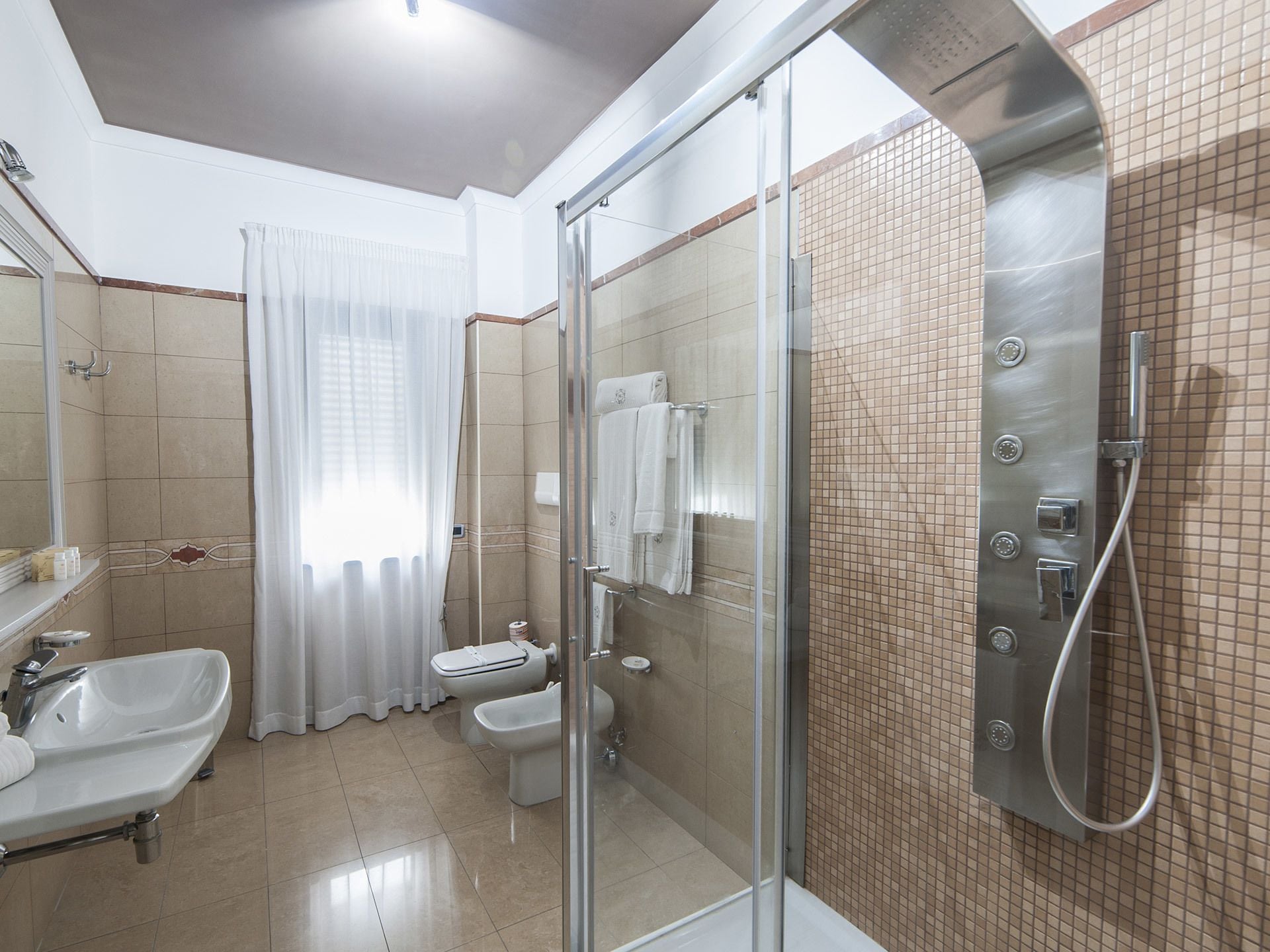 free toiletries, hair dryer, bidet, towels