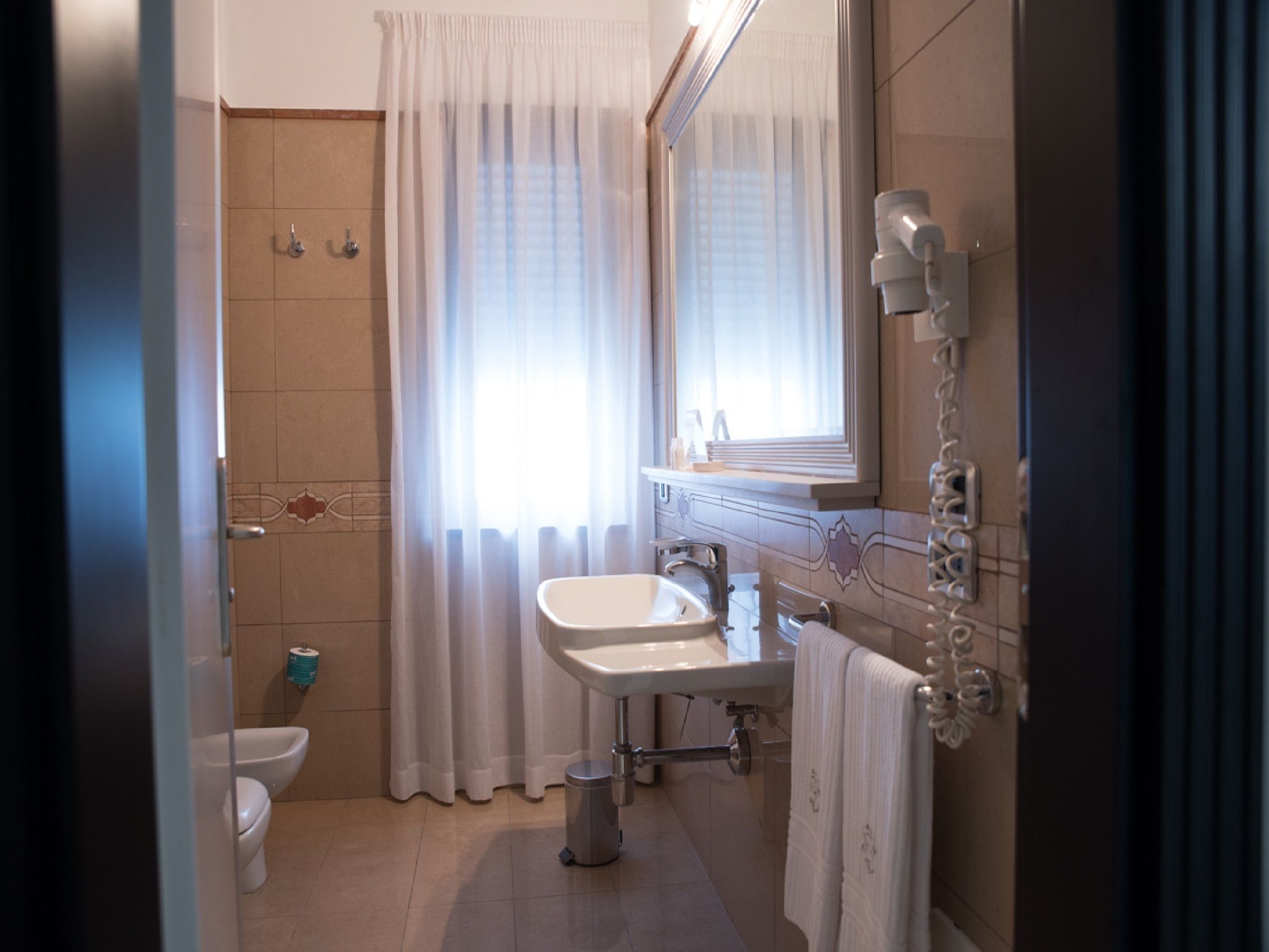 family room | bathroom | free toiletries, hair dryer, bidet, towels