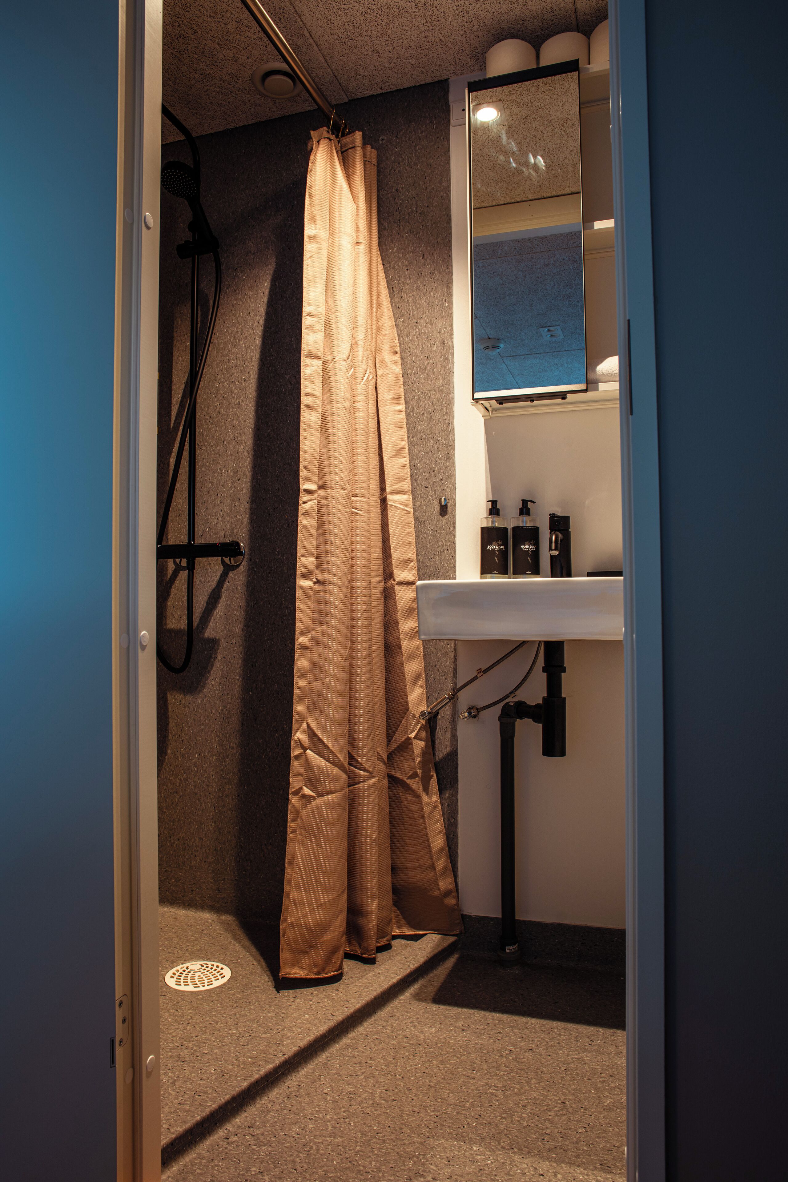 standard double room | bathroom | shower, hair dryer, towels, soap