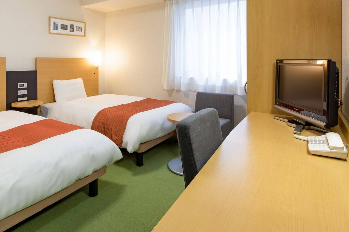 Premium bedding, desk, blackout curtains, soundproofing