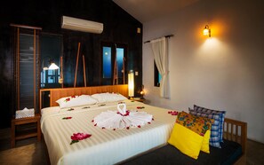 Ocean Front Bungalow | Minibar, in-room safe, desk, WiFi
