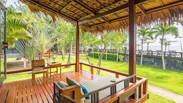 Ocean View Bungalow | Living area | 32-inch TV with cable channels