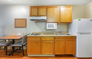Full-sized fridge, microwave, stovetop, freezer