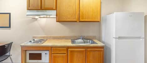 Full-sized fridge, microwave, stovetop, freezer