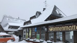 A building with a sign reading "Connematt". - B+B Hotel Sonnenmatte Near Badeparadies (Titisee-Neustadt)