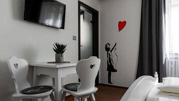 Standard Double Room, 1 King Bed | Living area | 60-cm flat-screen TV with cable channels
