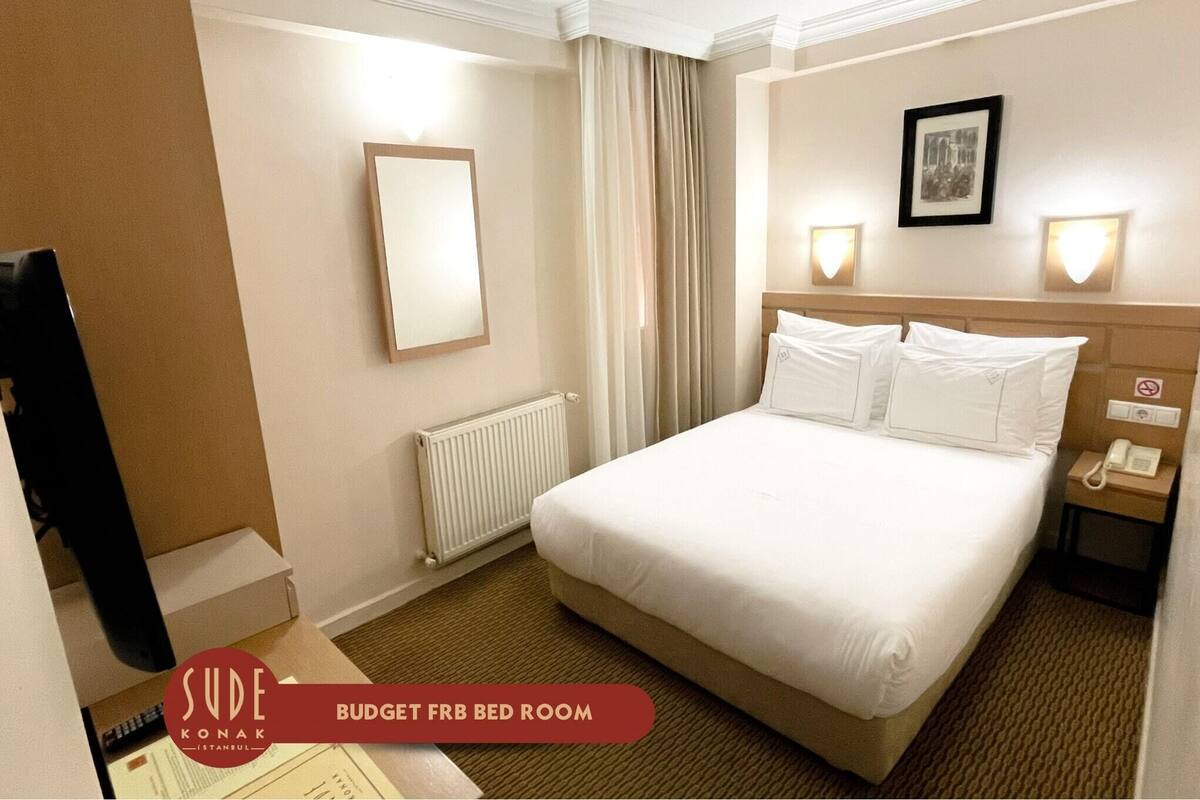 Minibar, desk, WiFi (free), bed sheets