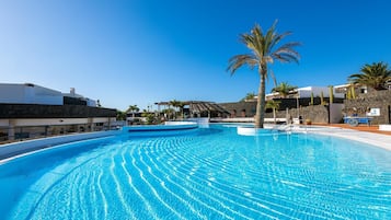 Outdoor pool, open 11:00 AM to 5:00 PM, pool umbrellas, pool loungers