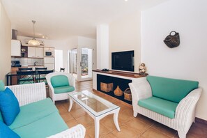 32-inch flat-screen TV with satellite channels, TV