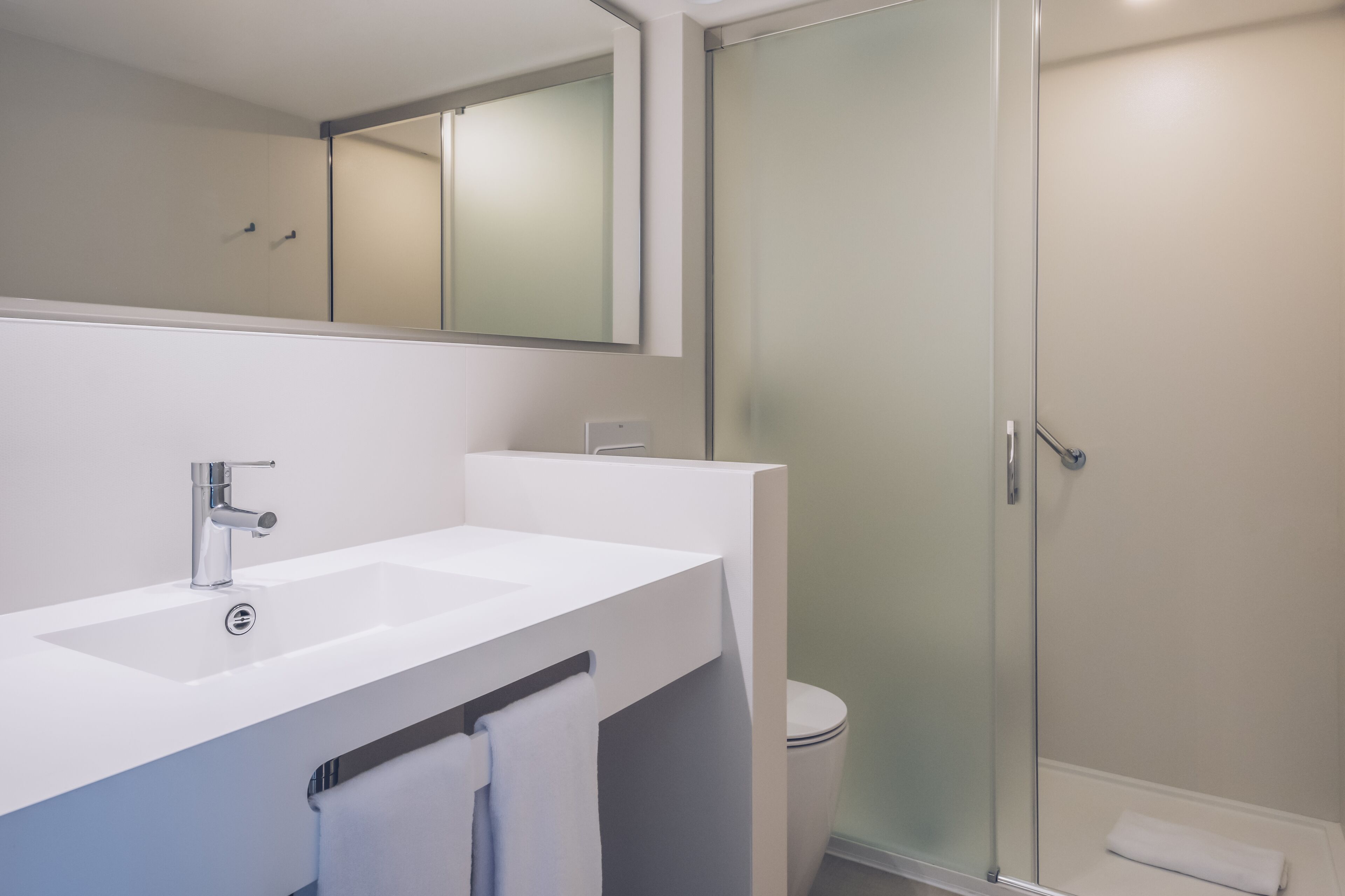 shower, eco-friendly toiletries, hair dryer, towels