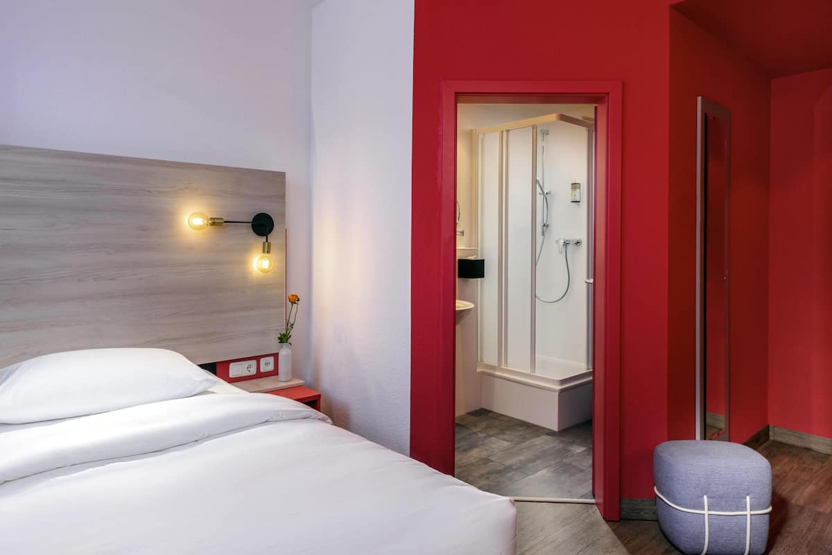 Hypo-allergenic bedding, blackout curtains, soundproofing, free WiFi