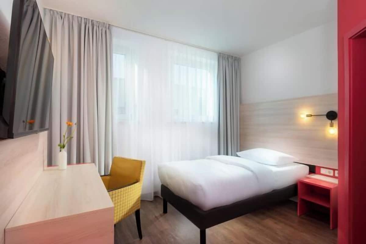 Hypo-allergenic bedding, blackout curtains, soundproofing, free WiFi