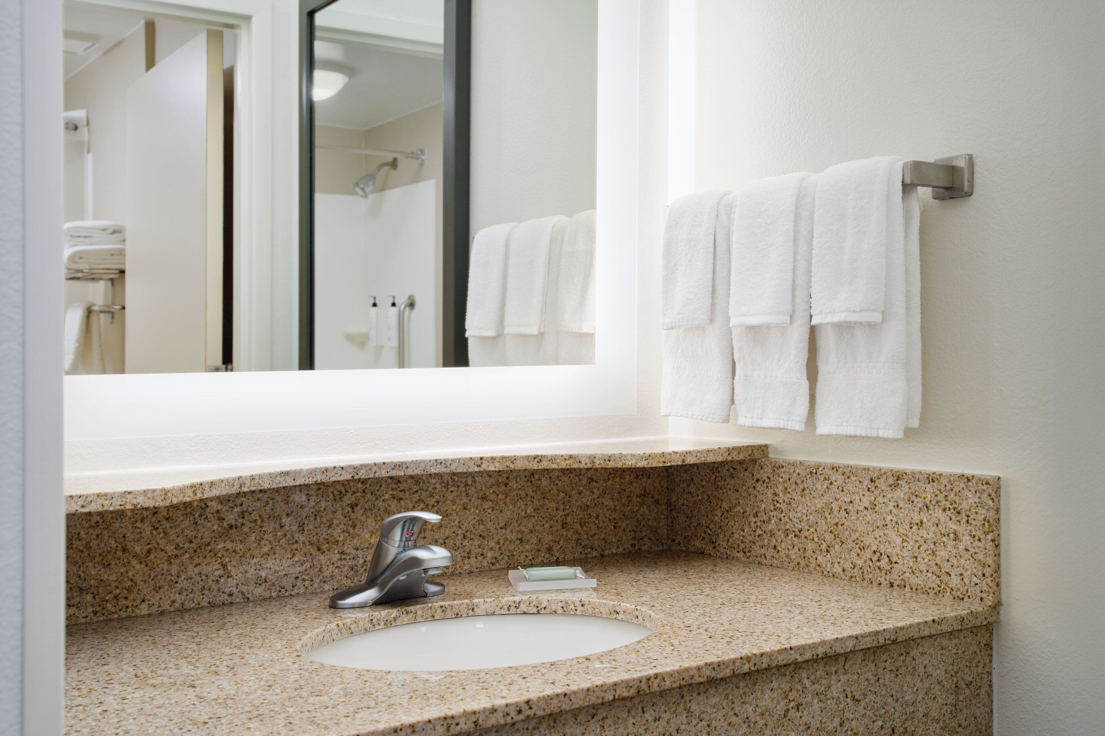 combined shower/bathtub, free toiletries, hair dryer, towels